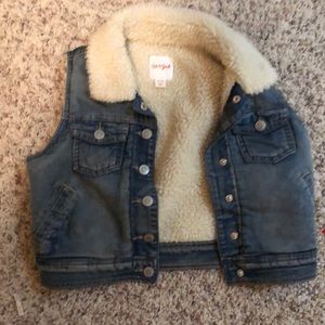 Faded blue jean vest